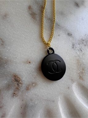 CHANEL Gold Chain with Black CC Medallion Pendant